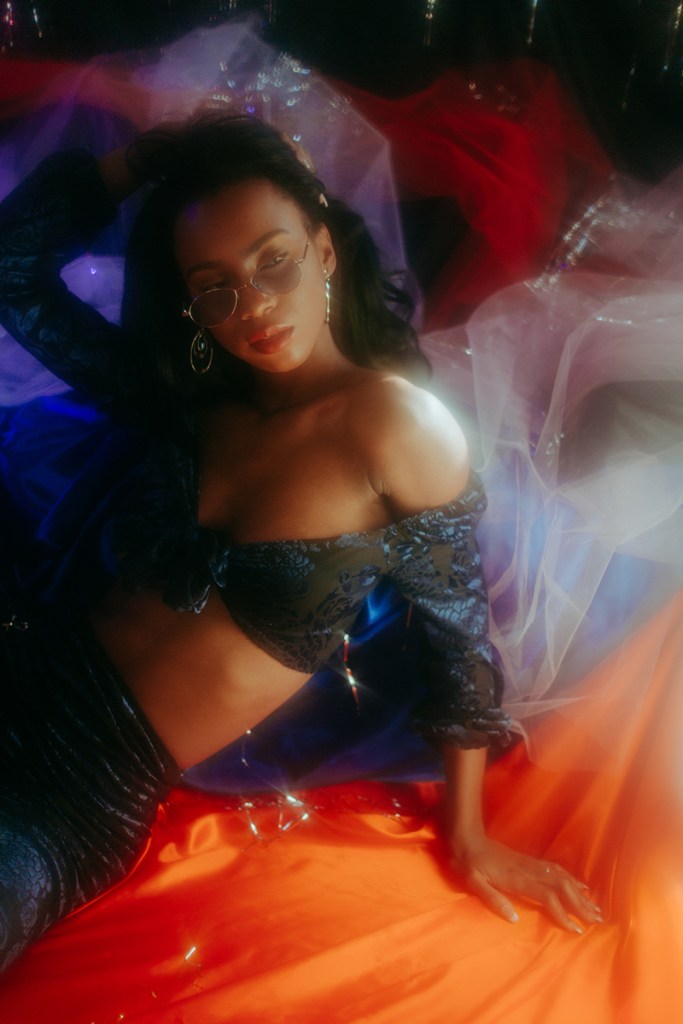 90s soft grunge girl on a orange veil