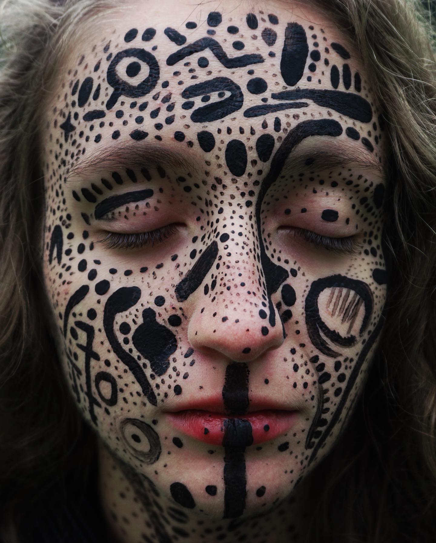 Girl with paint on the face